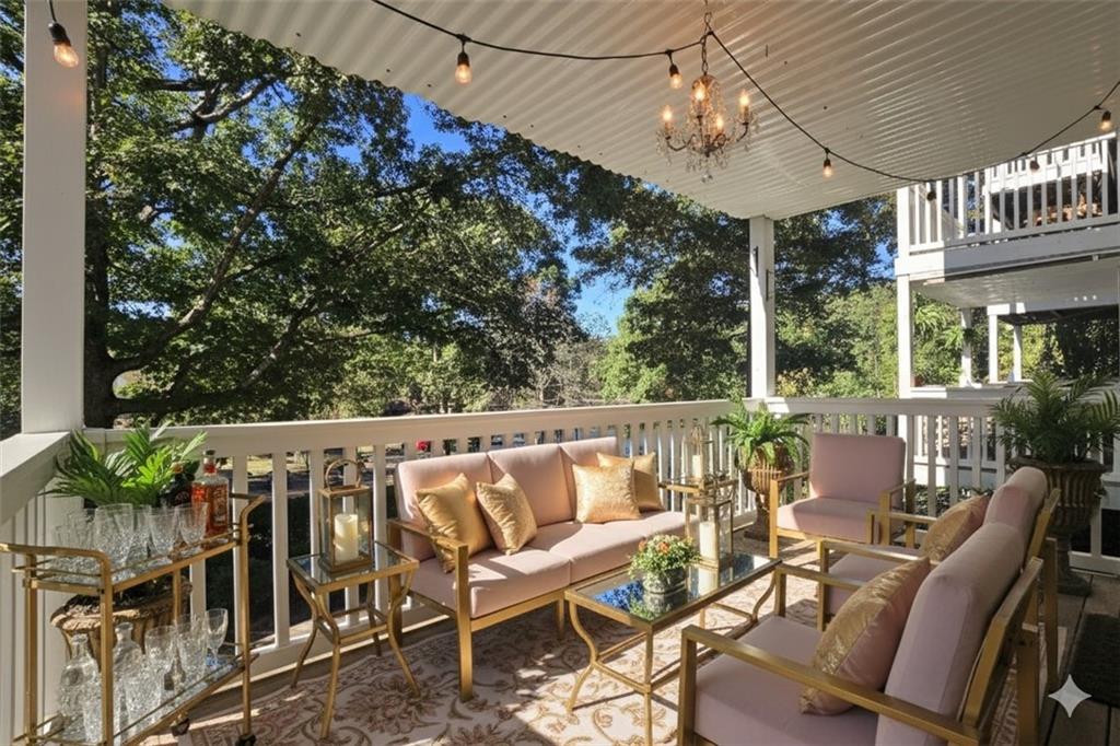 1418 Foxhall Lane Southeast, Unit 8 Atlanta, GA 30316 - Photo 6 of 50 a roof deck with table and chairs and potted plants