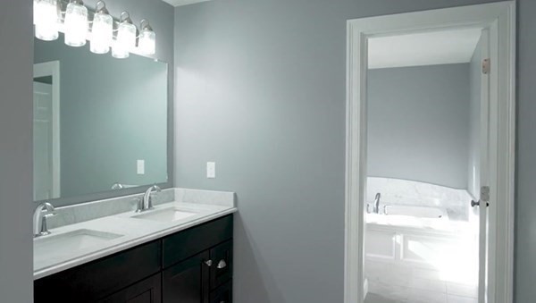 77 Woodside Avenue Rutland, MA 01543 - Photo 18 of 30 a bathroom with a sink vanity and a mirror
