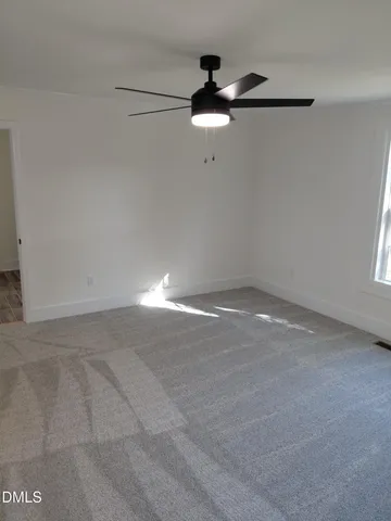 a view of a room with an empty space