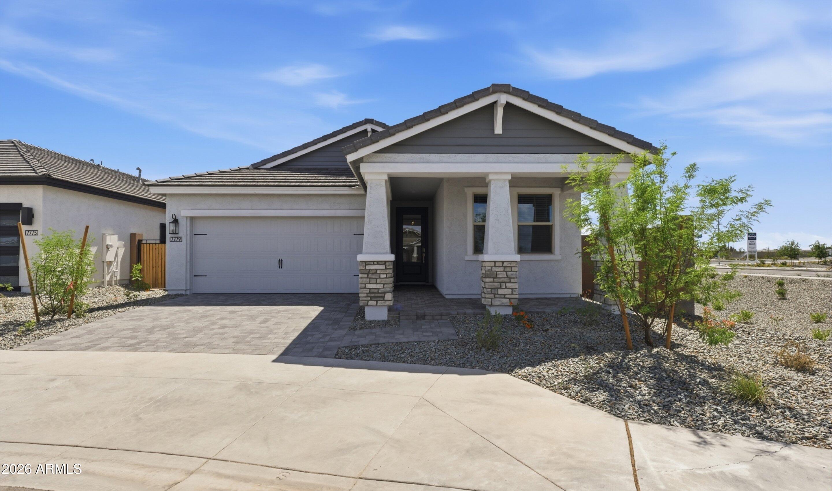 7779 West Sands Road Glendale, AZ 85303 - Photo 1 of 37 a front view of a house with garden