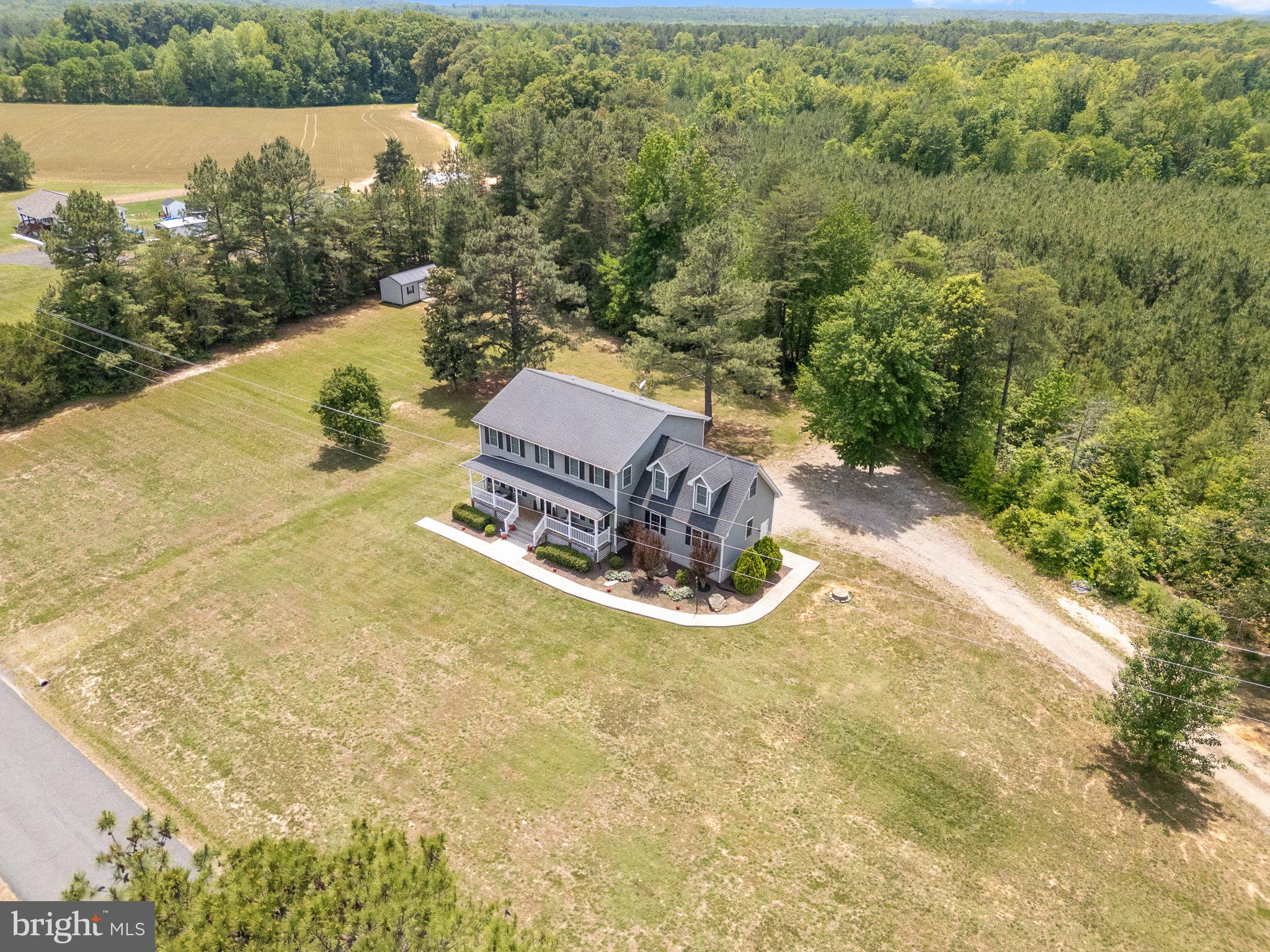 22088 Landora Bridge Road Ruther Glen, VA 22546 - Photo 6 of 122 Spacious home nestled in nature's embrace.