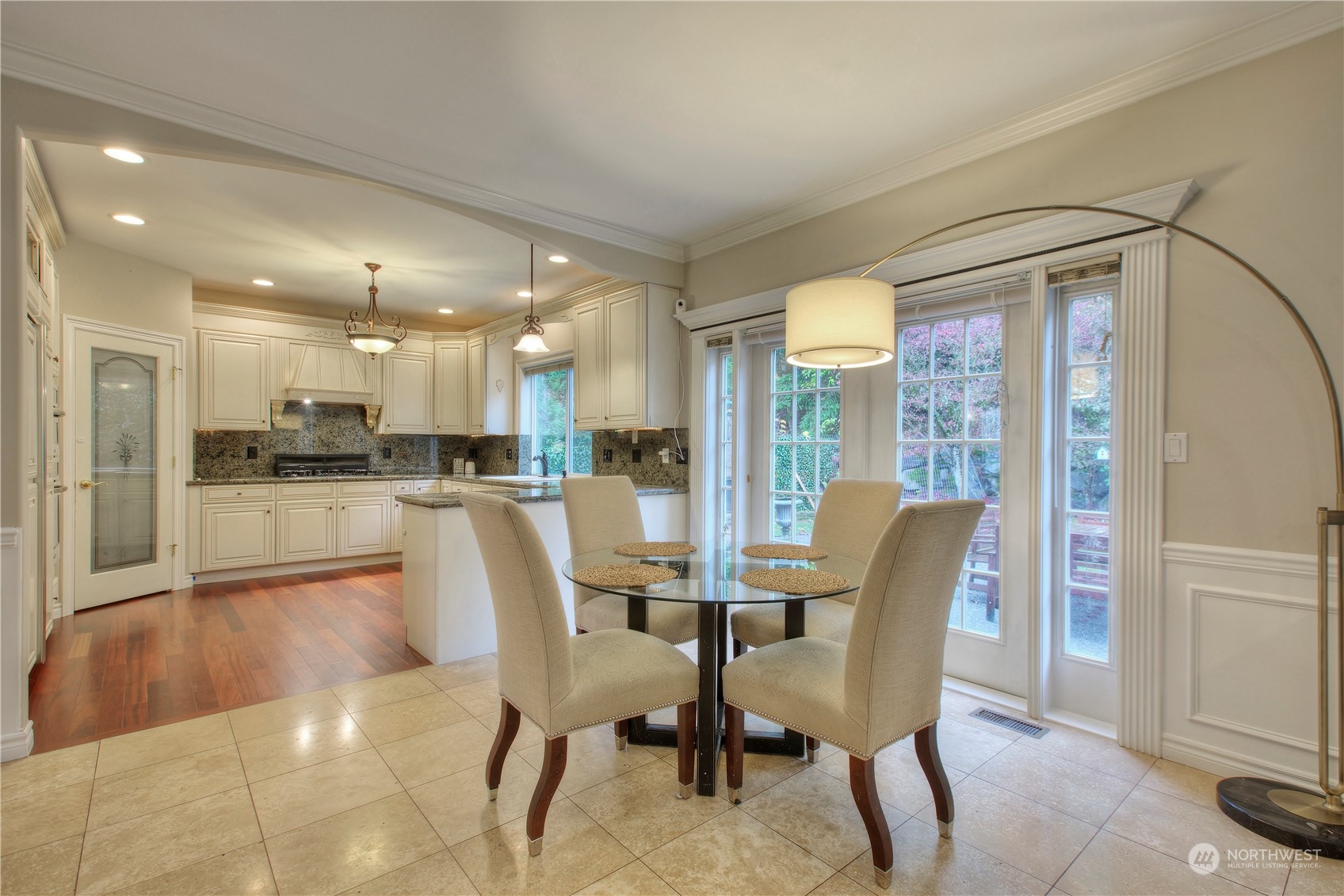 1013 R Street Northwest Auburn, WA 98001 - Photo 12 of 31 a dining room with furniture and a view of kitchen