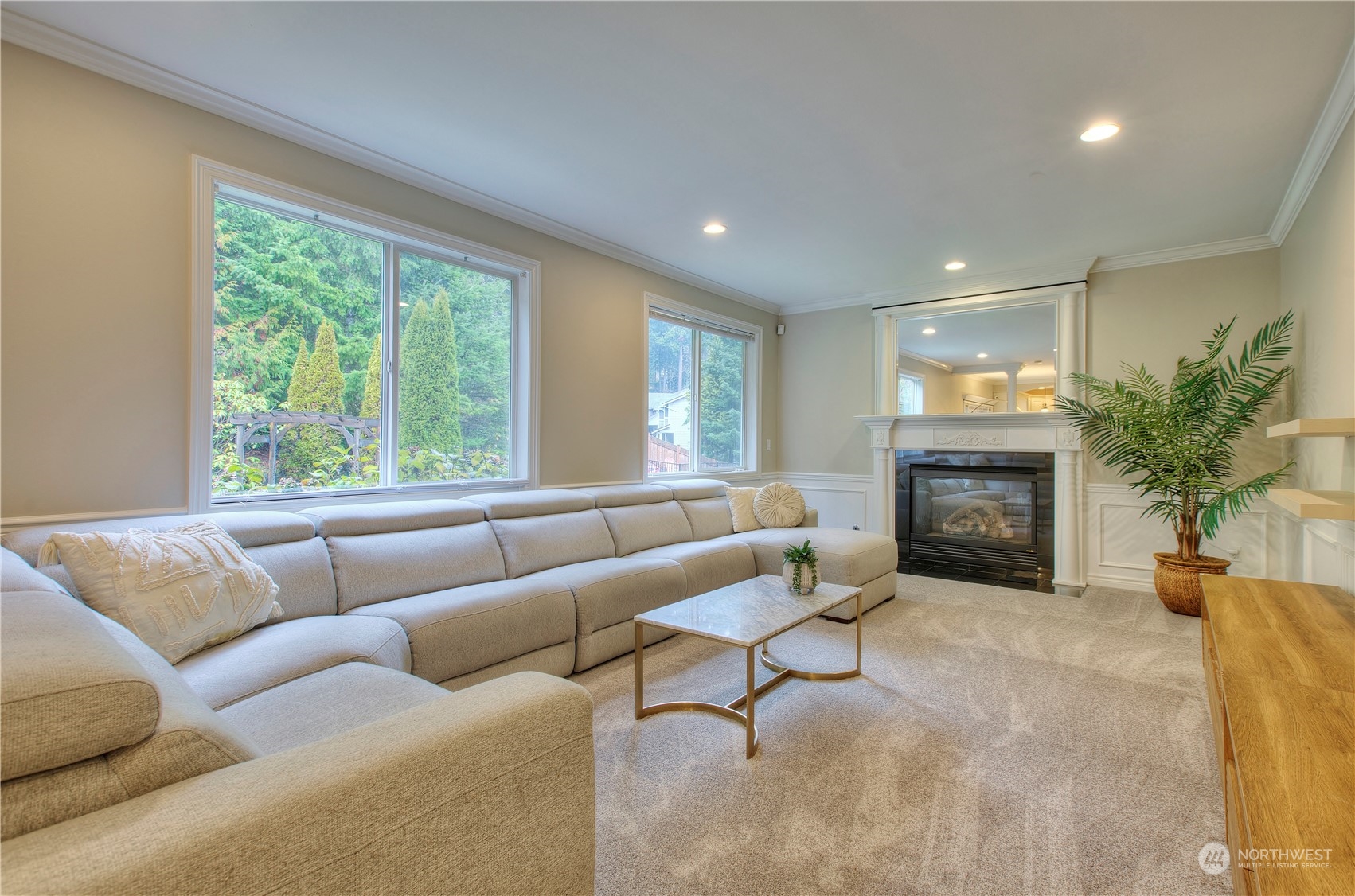 1013 R Street Northwest Auburn, WA 98001 - Photo 13 of 31 a living room with furniture and a fireplace