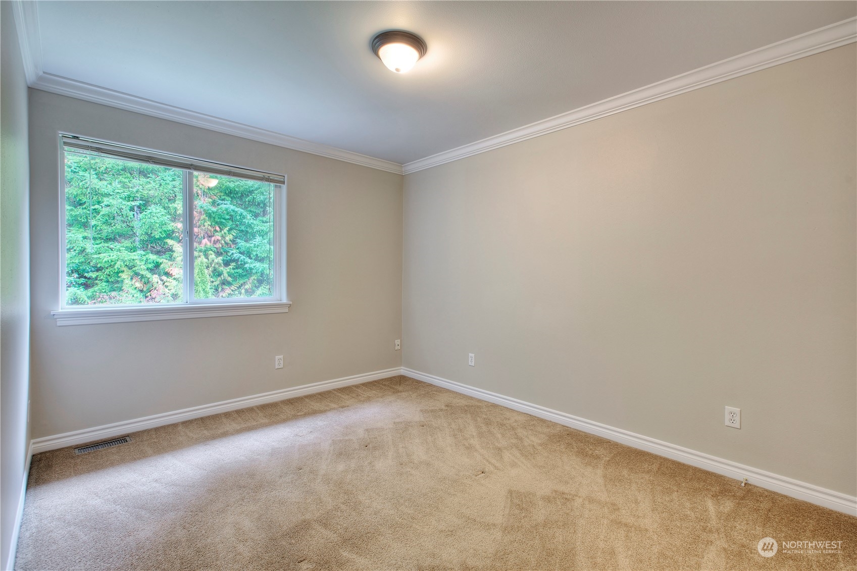 1013 R Street Northwest Auburn, WA 98001 - Photo 25 of 31 an empty room with a window