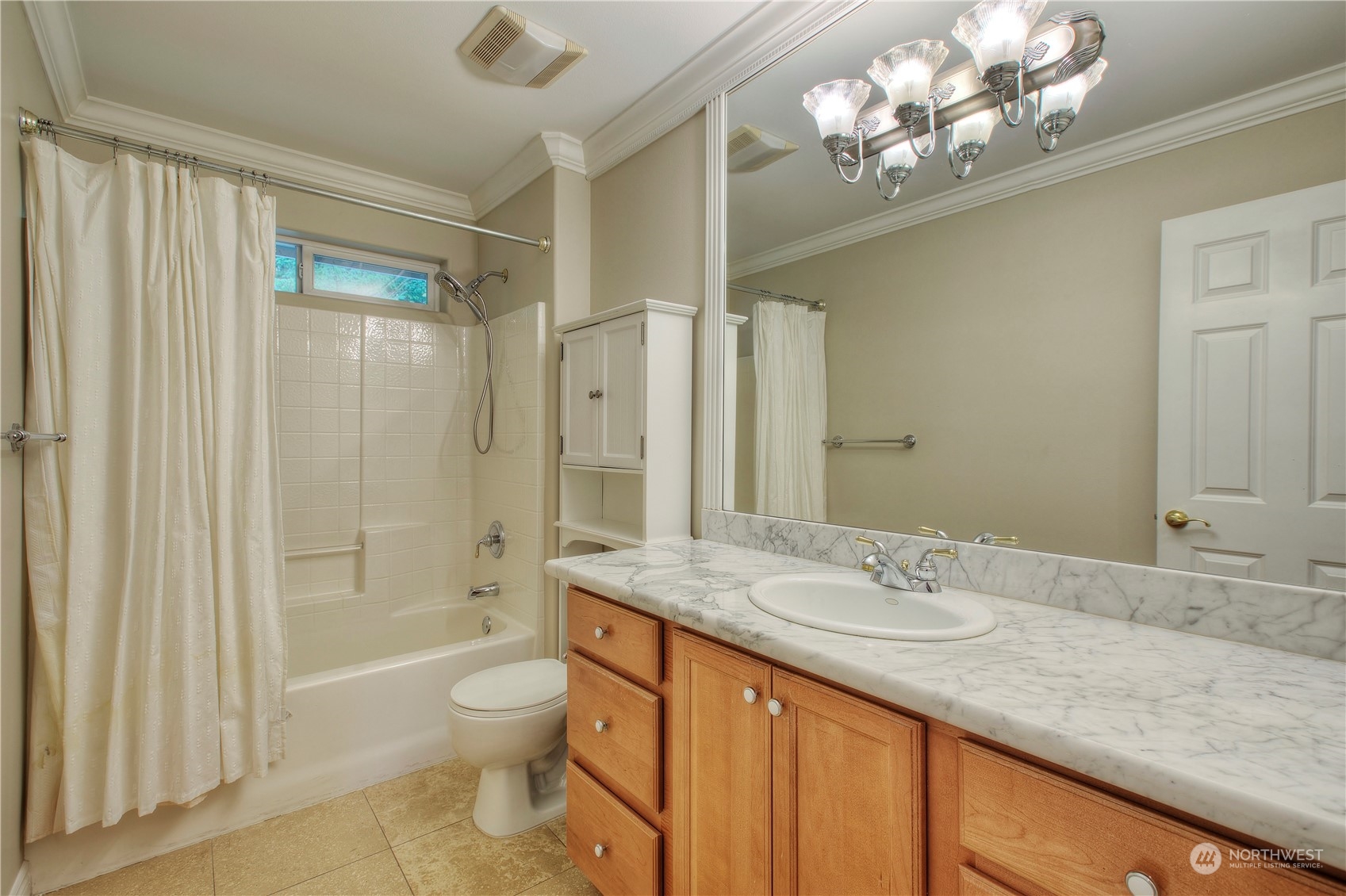 1013 R Street Northwest Auburn, WA 98001 - Photo 26 of 31 a bathroom with a granite countertop sink a toilet and shower