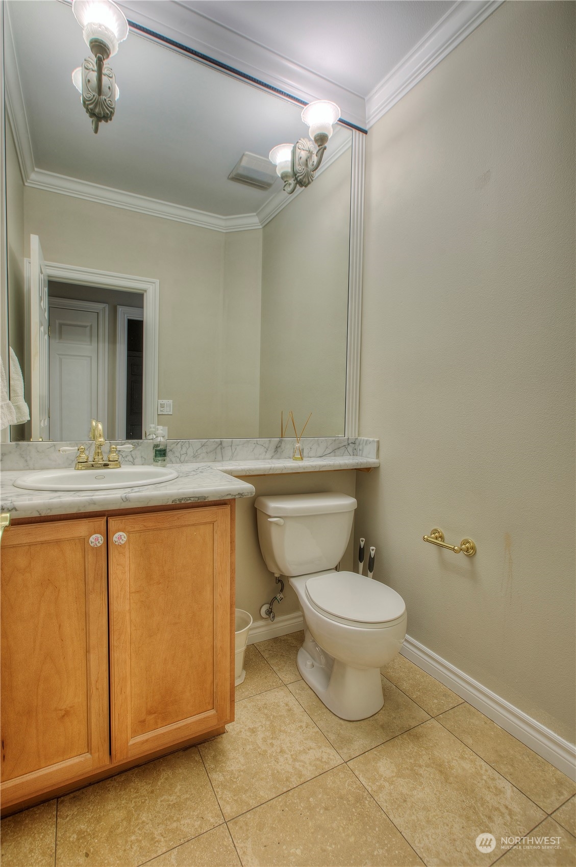 1013 R Street Northwest Auburn, WA 98001 - Photo 27 of 31 a bathroom with a sink toilet and vanity