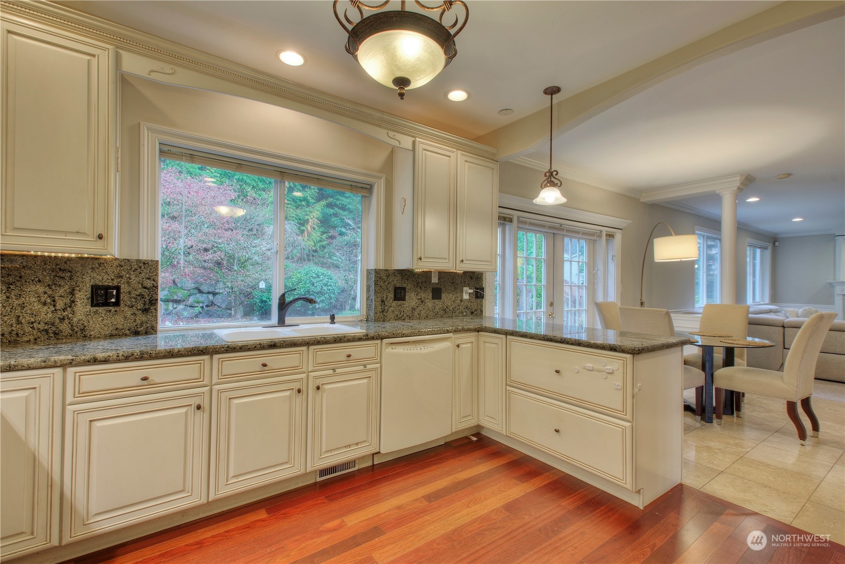 1013 R Street Northwest Auburn, WA 98001 - Photo 10 of 31 a kitchen with sink cabinets and wooden floor