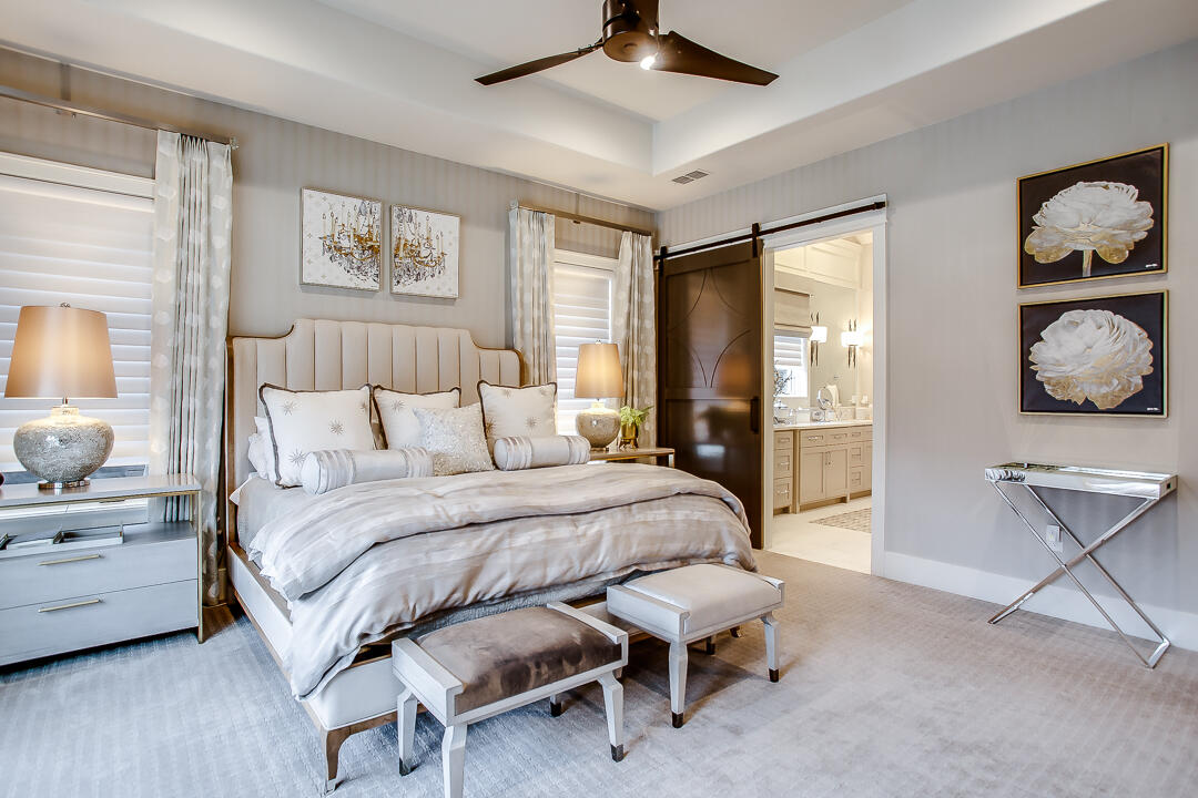 4821 119th Place Lubbock, TX 79424 - Photo 25 of 77 a bedroom with a bed a table and painting