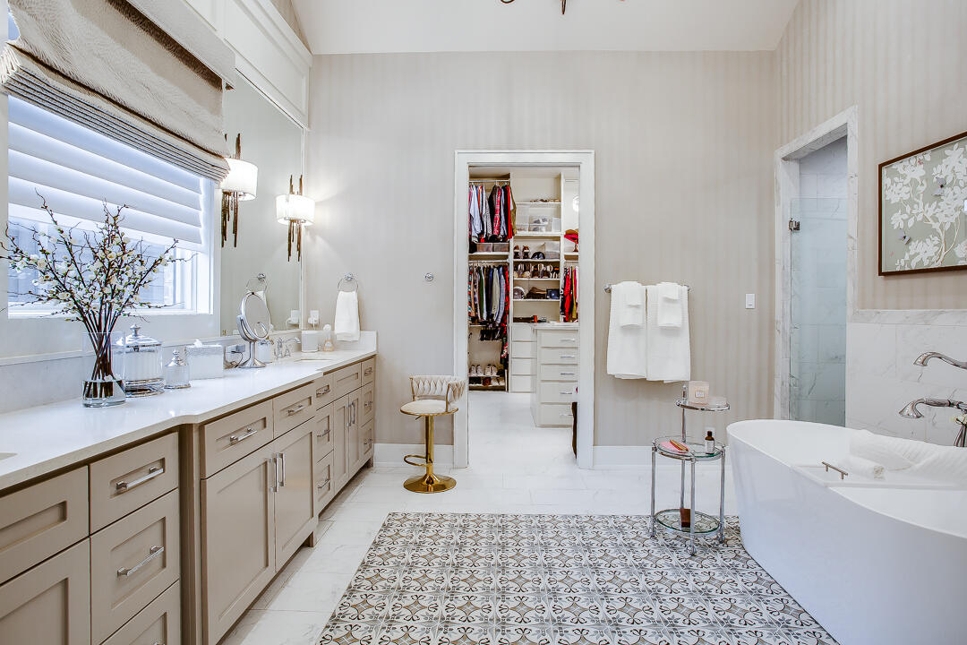 4821 119th Place Lubbock, TX 79424 - Photo 26 of 77 a bathroom with a sink a toilet and shower
