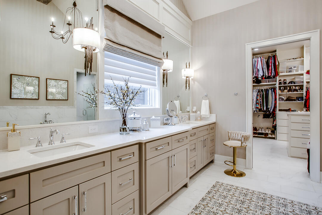 4821 119th Place Lubbock, TX 79424 - Photo 27 of 77 a bathroom with a double vanity sink and a mirror