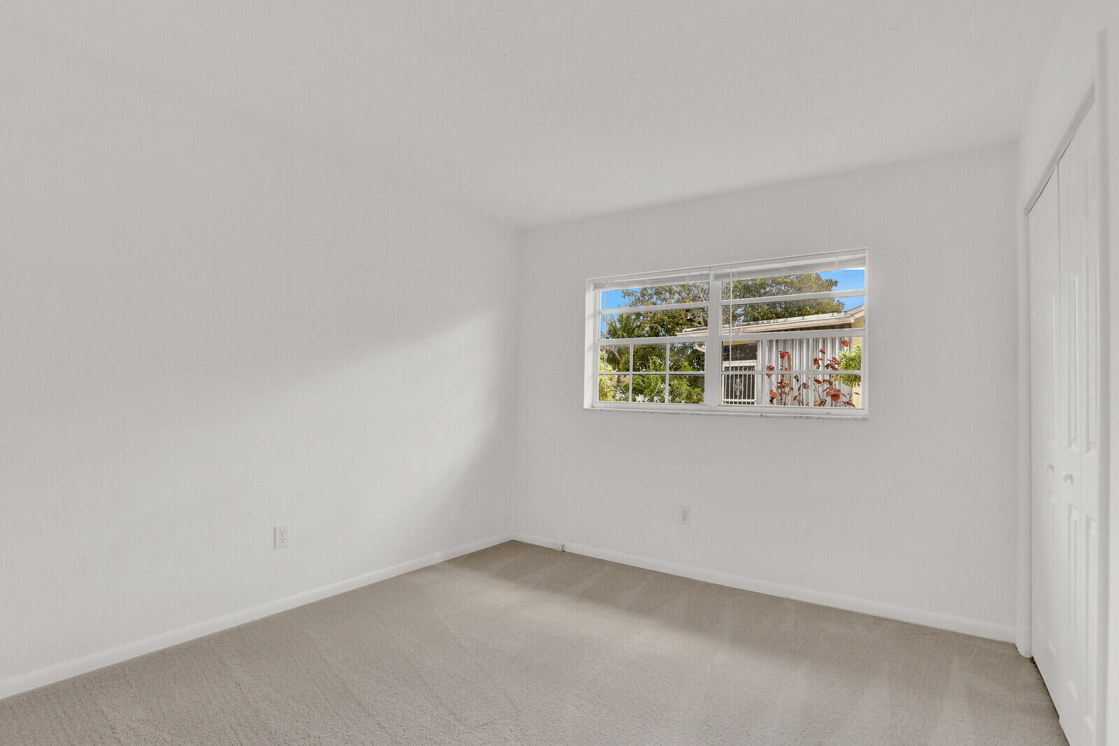 22600 Southwest 65th Way Boca Raton, FL 33428 - Photo 20 of 46 an empty room with windows