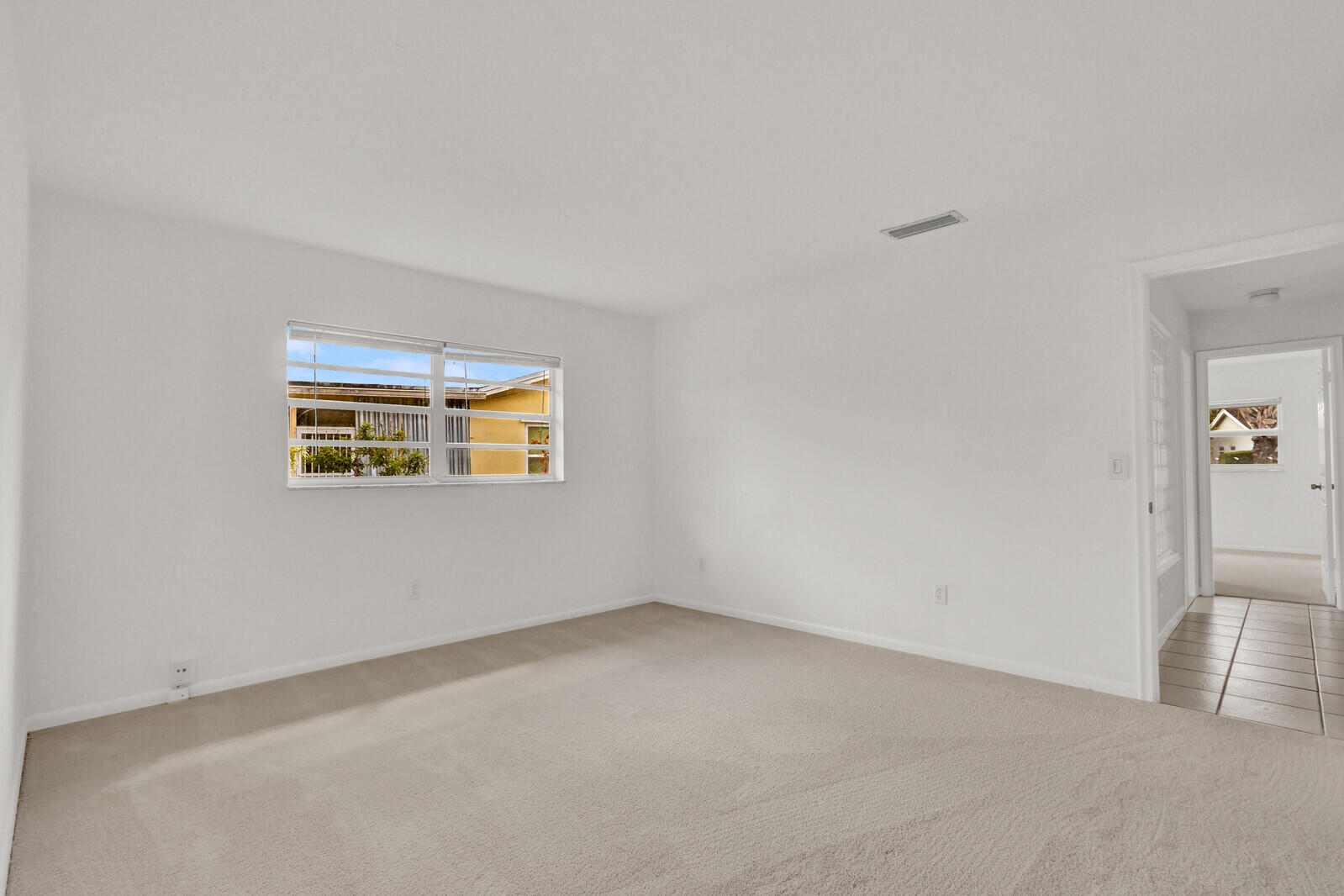 22600 Southwest 65th Way Boca Raton, FL 33428 - Photo 24 of 46 an empty room with windows