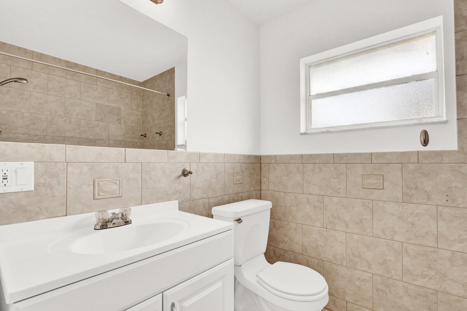 22600 Southwest 65th Way Boca Raton, FL 33428 - Photo 26 of 46 a bathroom with a sink a toilet and a mirror