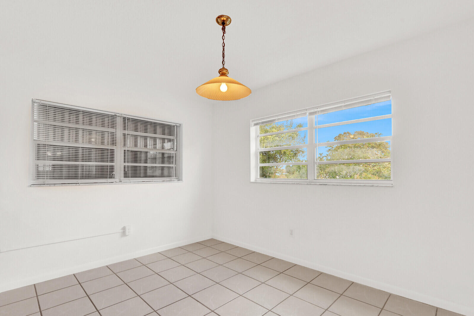 22600 Southwest 65th Way Boca Raton, FL 33428 - Photo 30 of 46 an empty room with windows