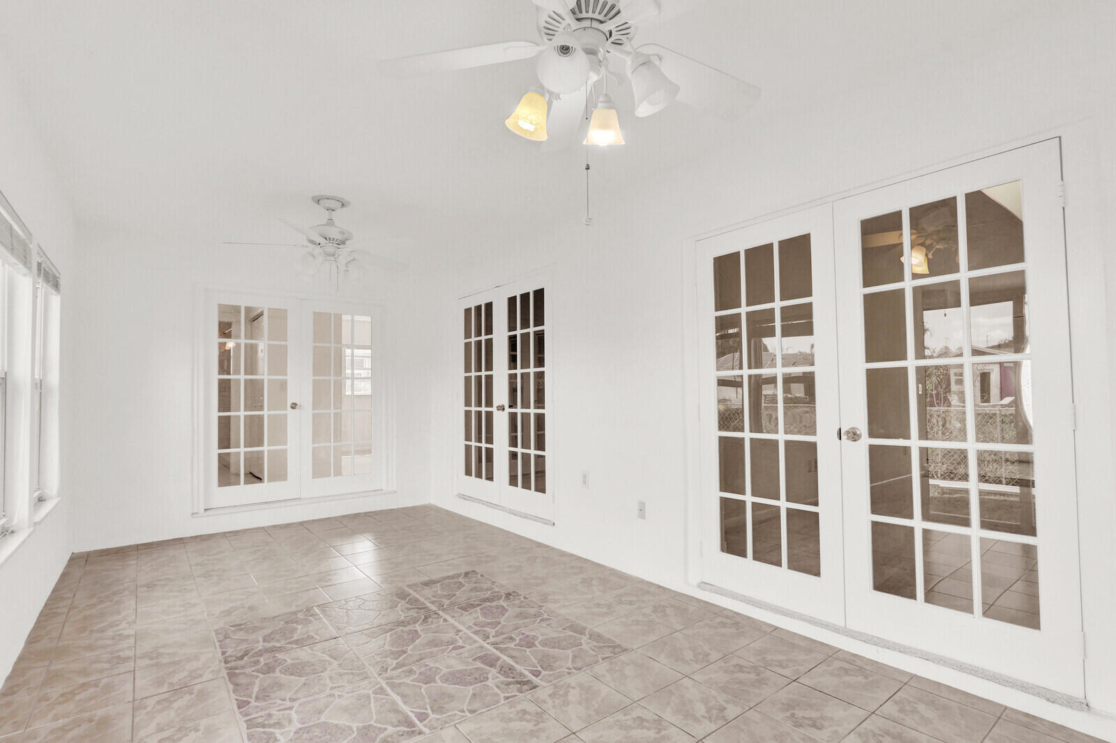 22600 Southwest 65th Way Boca Raton, FL 33428 - Photo 35 of 46 a view of an empty room with a window