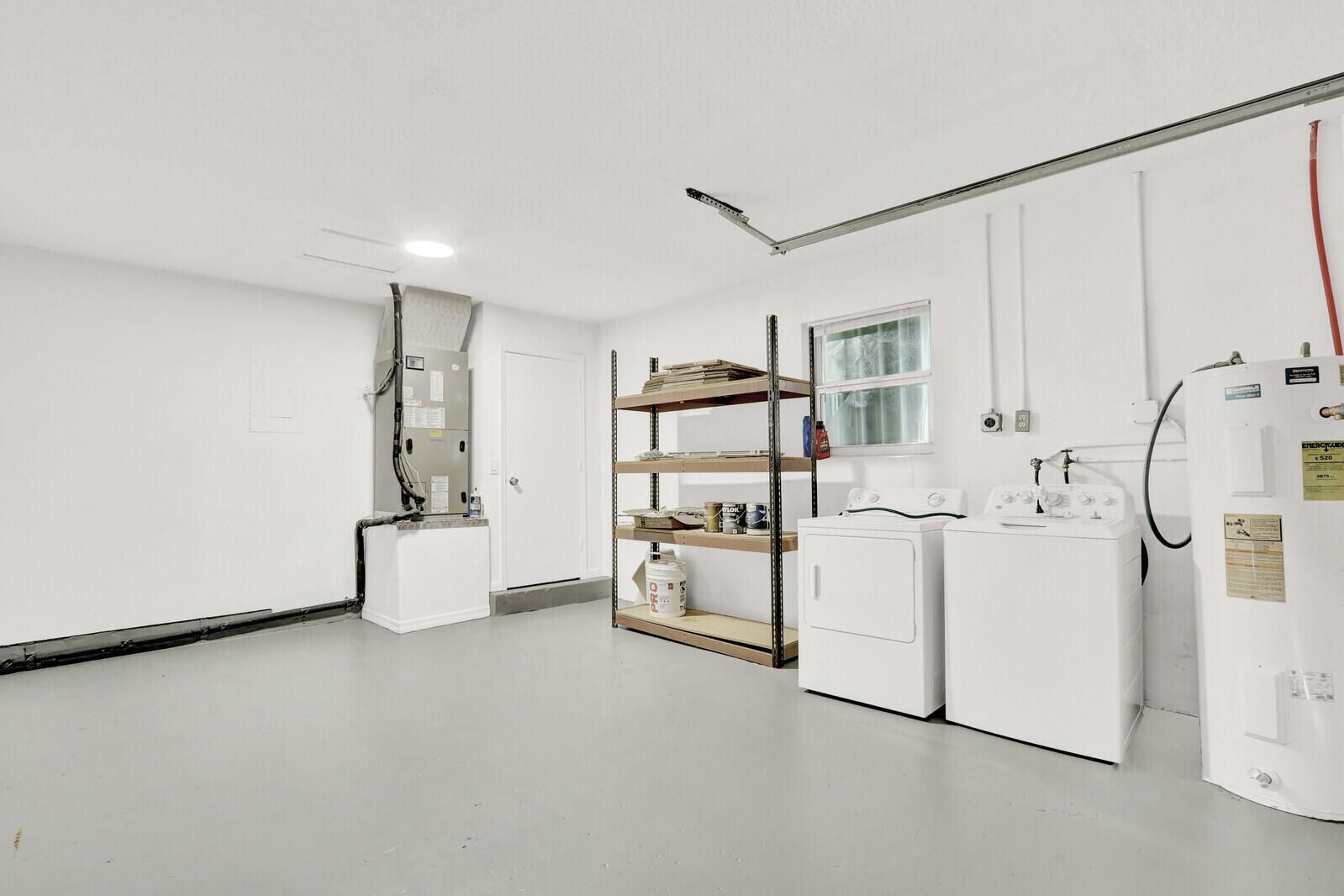22600 Southwest 65th Way Boca Raton, FL 33428 - Photo 36 of 46 a view of kitchen with refrigerator and white cabinets