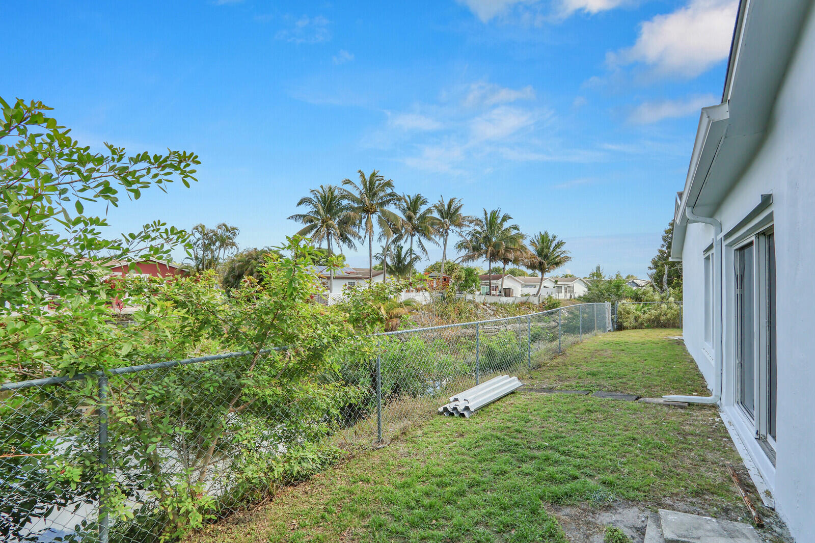 22600 Southwest 65th Way Boca Raton, FL 33428 - Photo 40 of 46 a view of a garden with an outdoor space