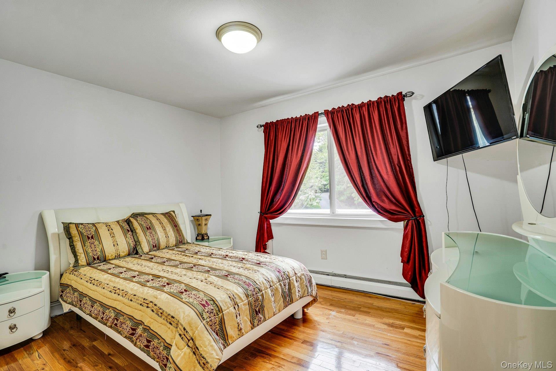 41 Hearthstone Drive Dix Hills, NY 11746 - Photo 24 of 50 a bedroom with a bed and a window