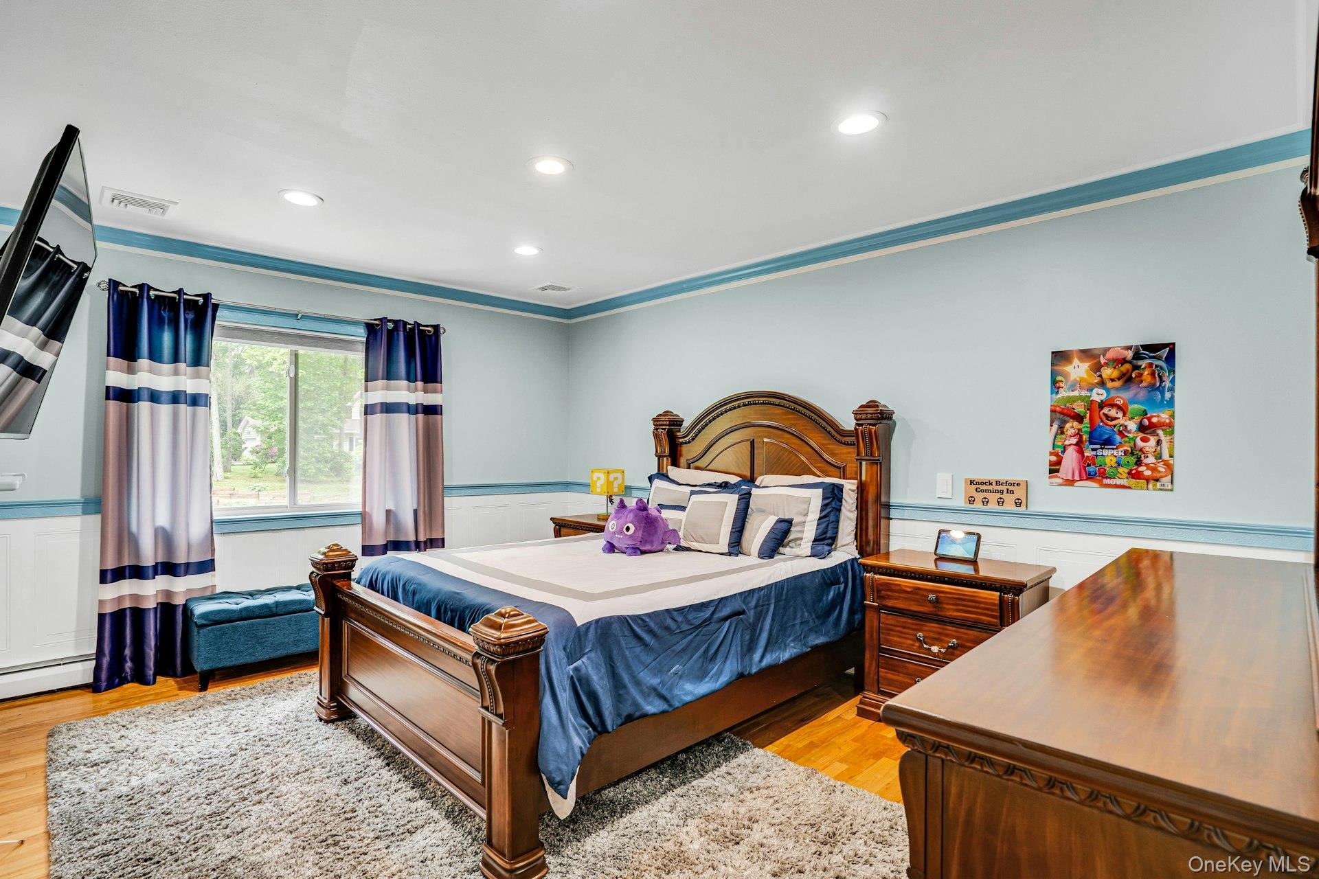 41 Hearthstone Drive Dix Hills, NY 11746 - Photo 27 of 50 a bedroom with a bed and a dresser next to a window