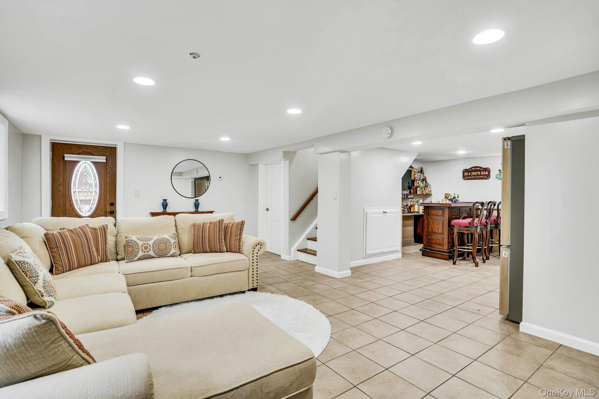 41 Hearthstone Drive Dix Hills, NY 11746 - Photo 34 of 50 a living room with furniture and a wooden floor