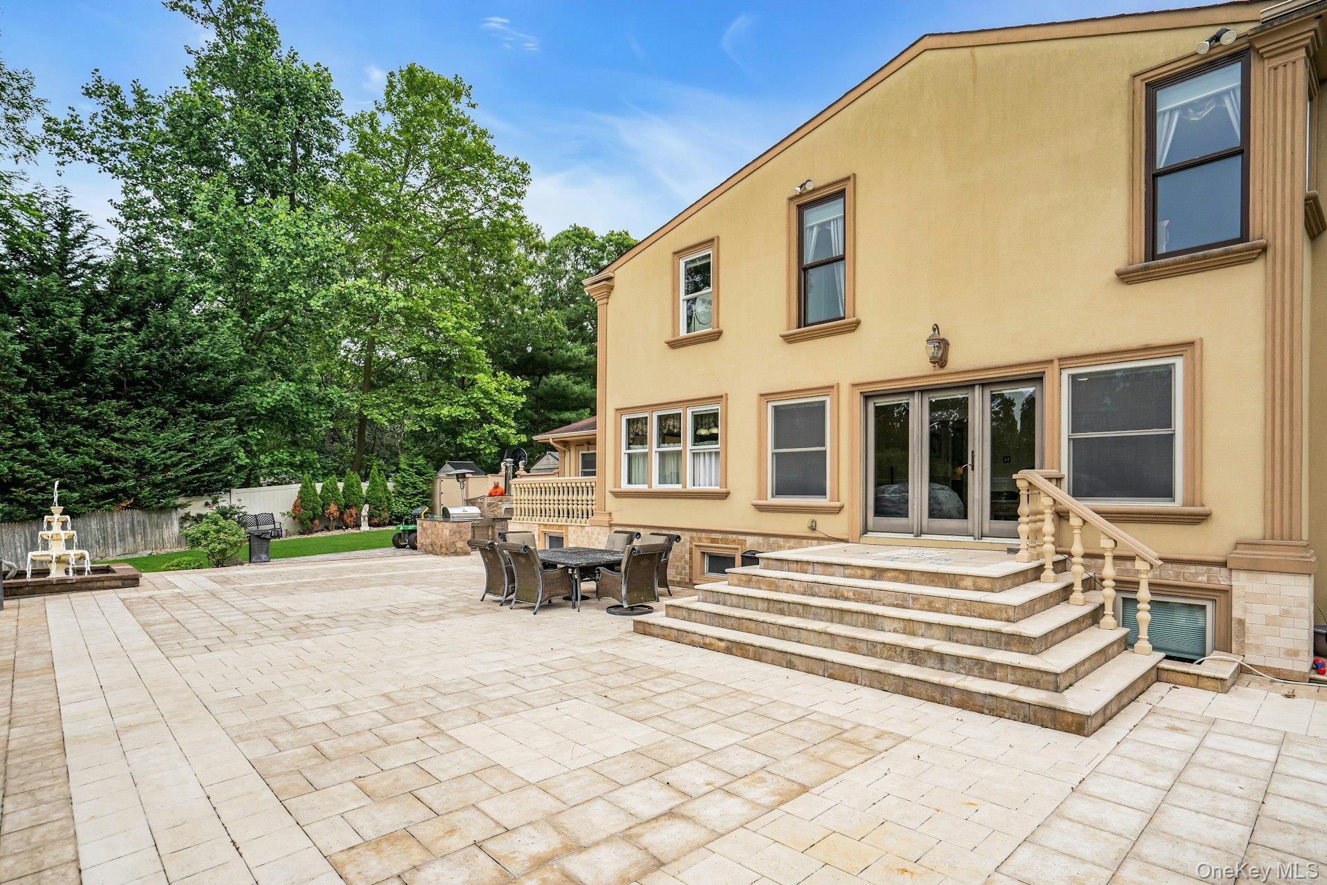 41 Hearthstone Drive Dix Hills, NY 11746 - Photo 43 of 50 a view of a house with a bench