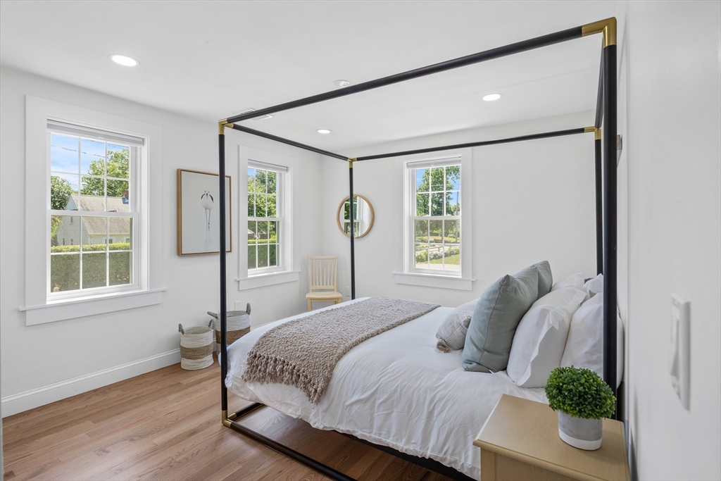 6 Stenbeck Place Scituate, MA 02066 - Photo 13 of 24 a bedroom with a large bed and a window