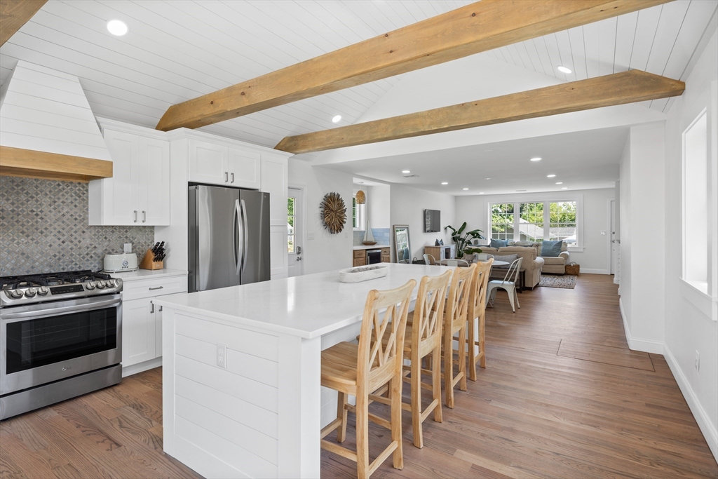 6 Stenbeck Place Scituate, MA 02066 - Photo 5 of 24 a large kitchen with a table and chairs