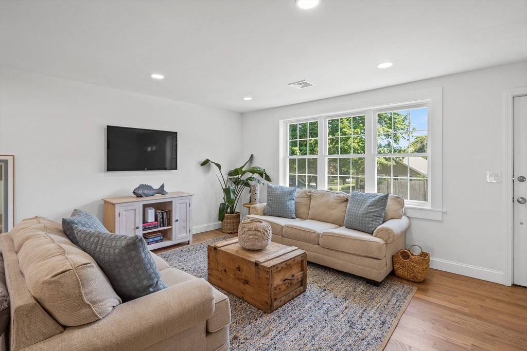 6 Stenbeck Place Scituate, MA 02066 - Photo 10 of 24 a living room with furniture and a flat screen tv