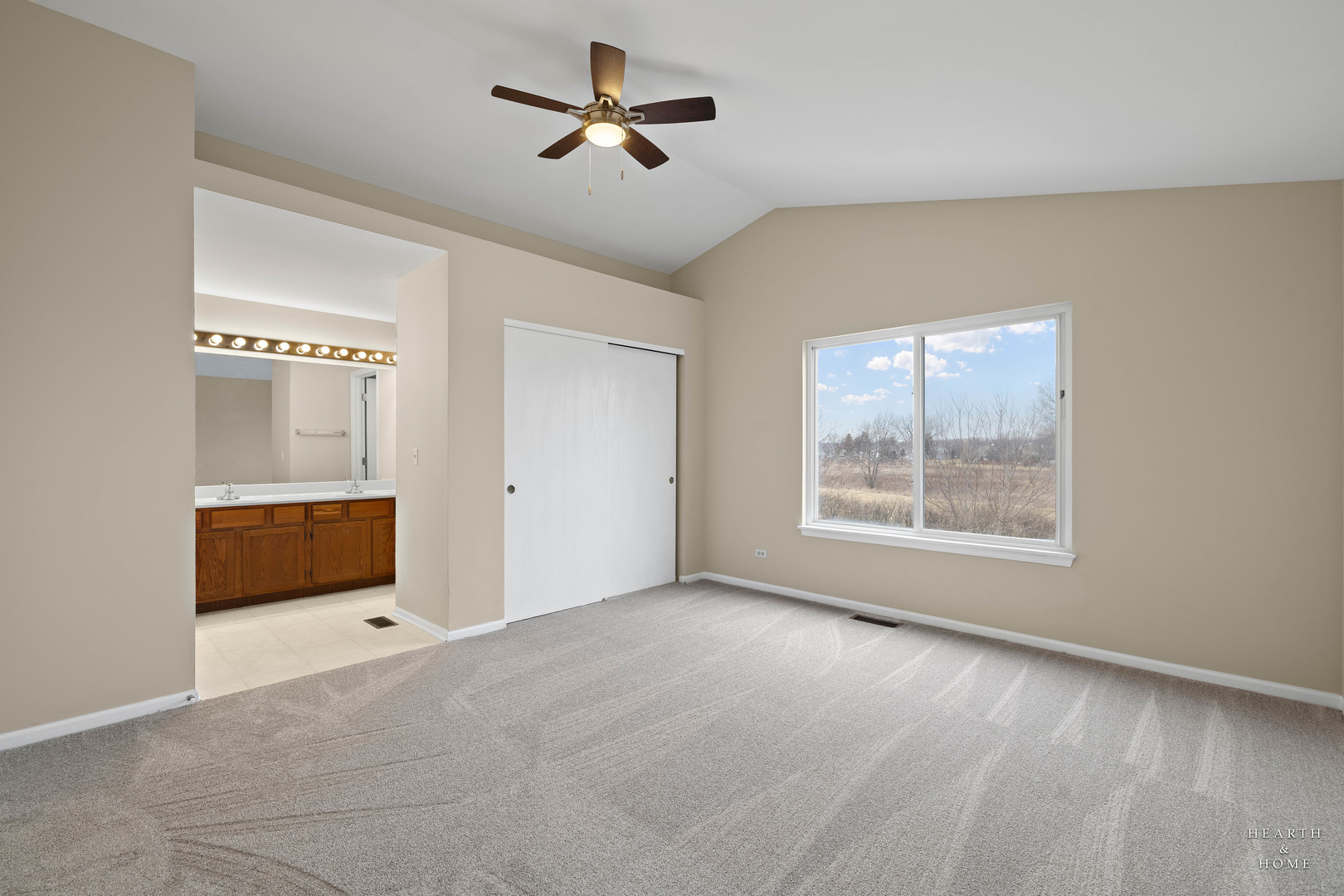 305 Harvest Gate Road Lake In The Hills, IL 60156 - Photo 17 of 36 a view of an empty room with a window