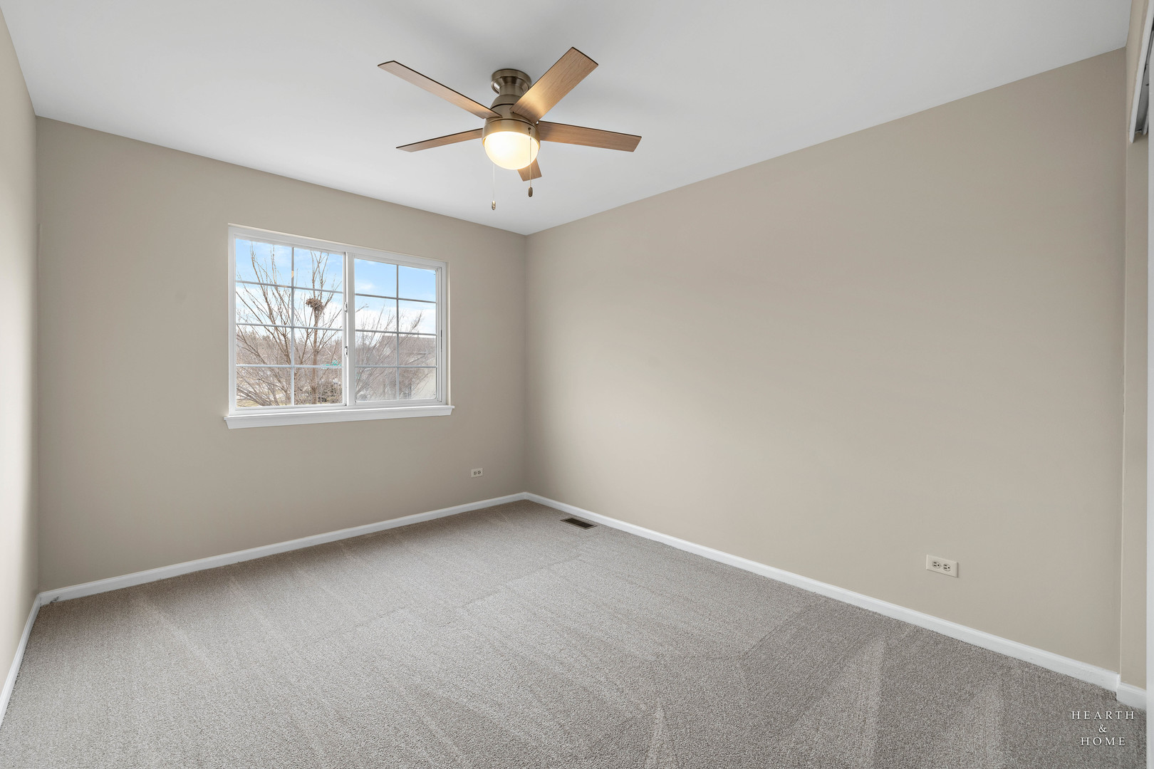305 Harvest Gate Road Lake In The Hills, IL 60156 - Photo 19 of 36 an empty room with a window