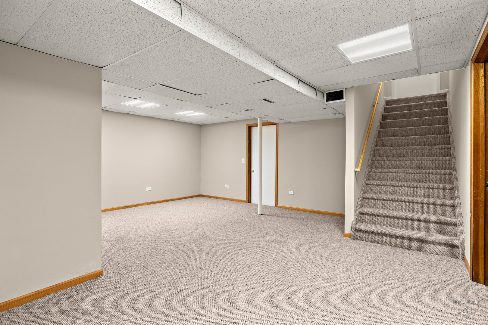 305 Harvest Gate Road Lake In The Hills, IL 60156 - Photo 24 of 36 a view of an empty room with a fireplace