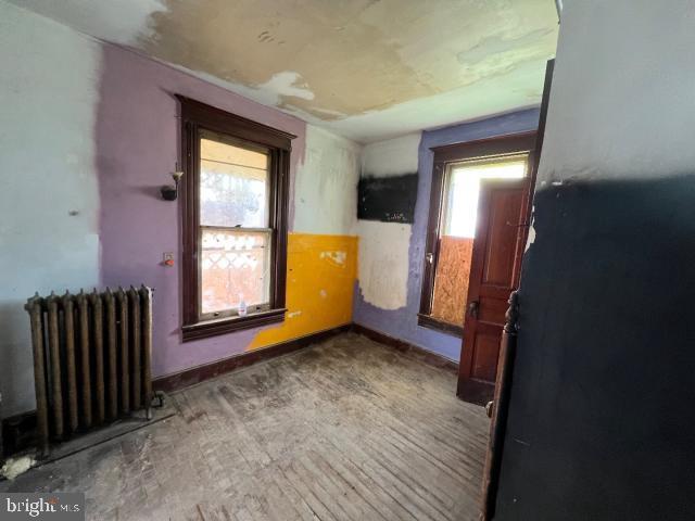 127 West Main Street Westminster, MD 21157 - Photo 17 of 25 an empty room with windows