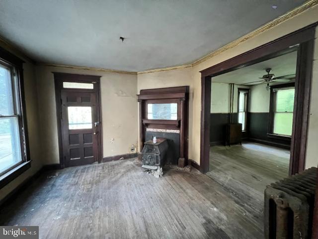 127 West Main Street Westminster, MD 21157 - Photo 22 of 25 wooden floor and windows in a room