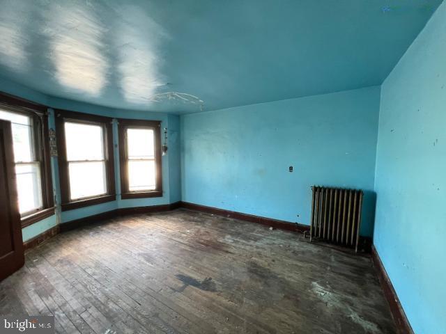 127 West Main Street Westminster, MD 21157 - Photo 7 of 25 an empty room with windows