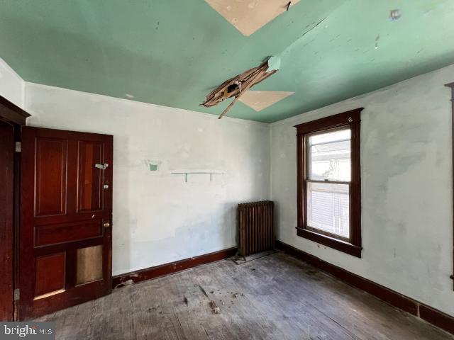 127 West Main Street Westminster, MD 21157 - Photo 8 of 25 a view of an empty room with window and stairs