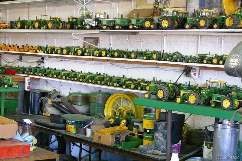 2024 Strasburg Road Strasburg, CO 80136 - Photo 17 of 18 an outdoor view of the swimming pool and outdoor seating