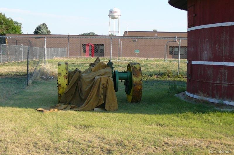 2024 Strasburg Road Strasburg, CO 80136 - Photo 6 of 18 a view of a backyard