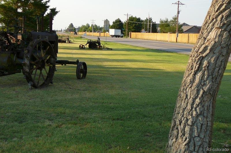 2024 Strasburg Road Strasburg, CO 80136 - Photo 8 of 18 a view of an outdoor space and slide