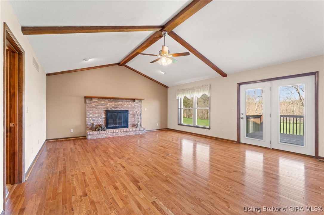 470 South Heidelberg Road Southwest Corydon, IN 47112 - Photo 3 of 92 Family Room w/ woodburning fireplace and patio doors leading to the deck.
