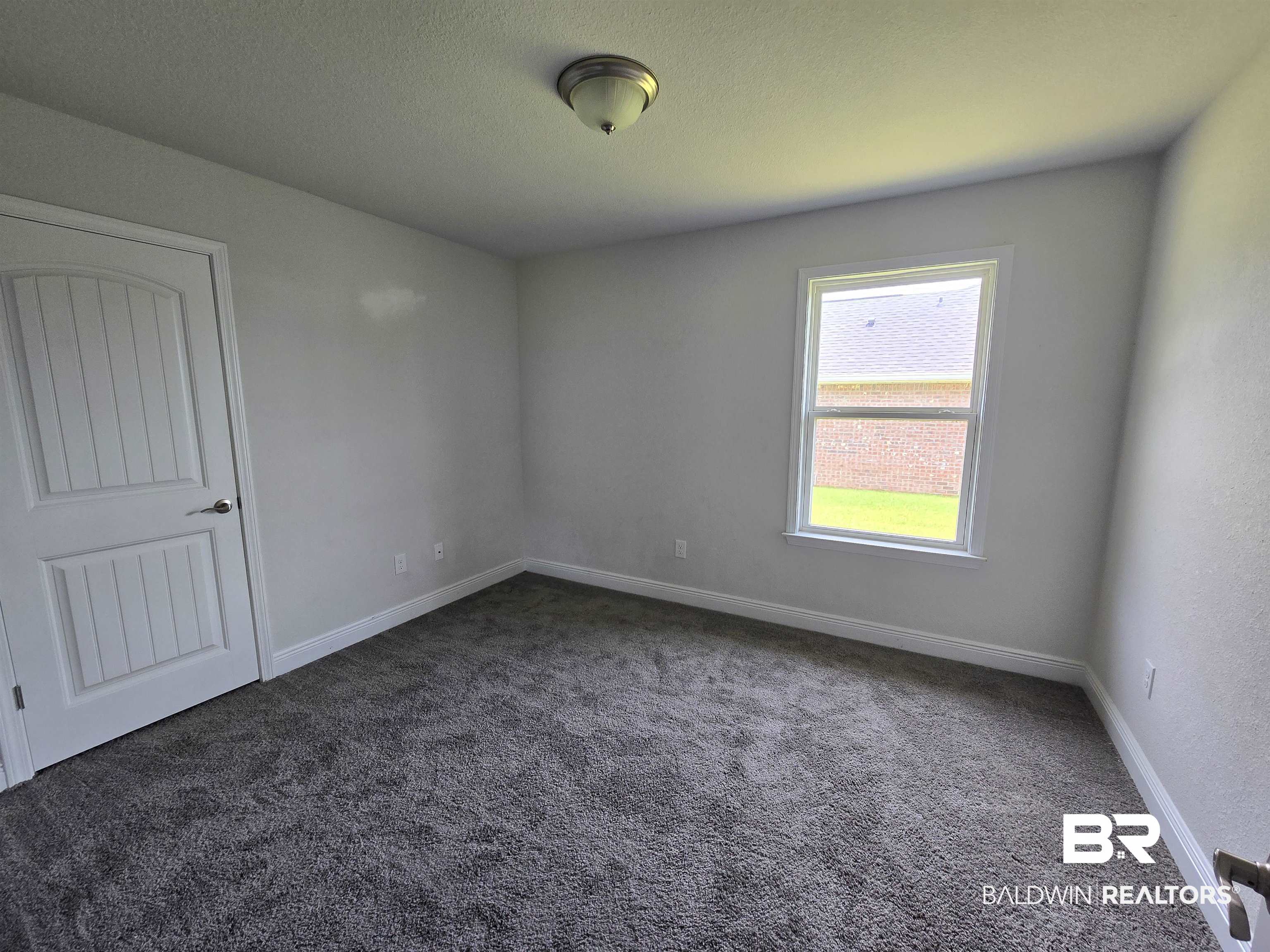 23035 Ridgewood Drive Robertsdale, AL 36567 - Photo 12 of 17 Guest Bedroom 2