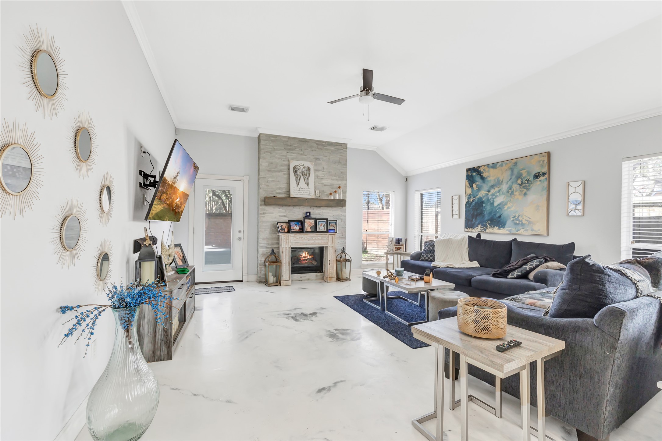 14415 Red Mulberry Lane Houston, TX 77044 - Photo 14 of 26 a living room with furniture and a fireplace
