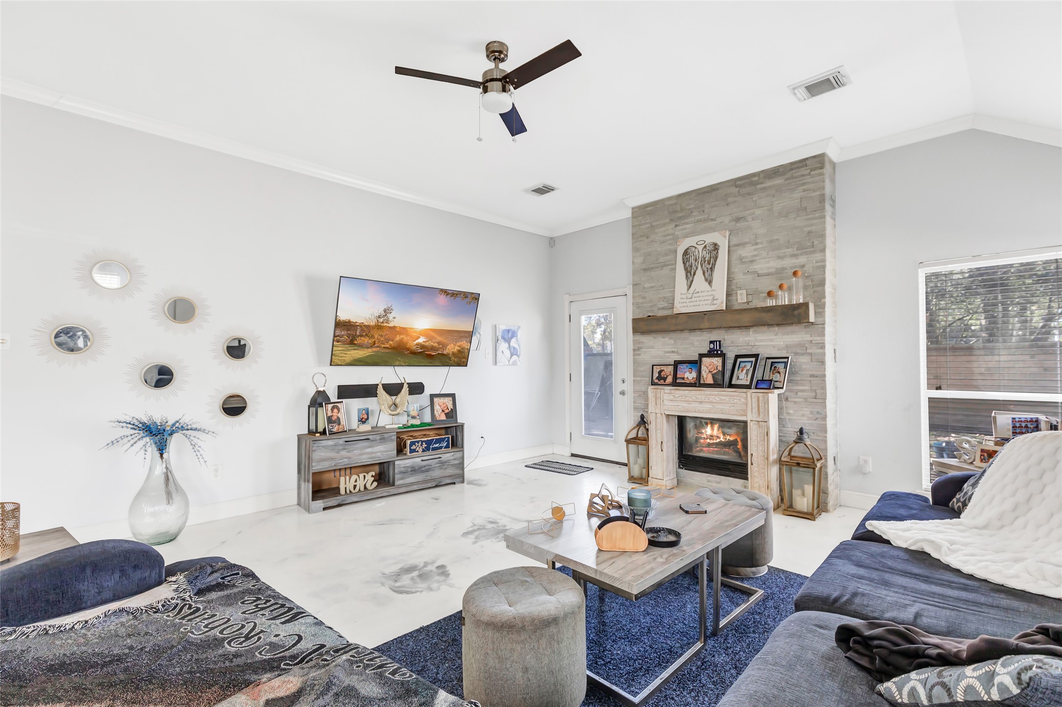 14415 Red Mulberry Lane Houston, TX 77044 - Photo 15 of 26 a living room with furniture and a fireplace