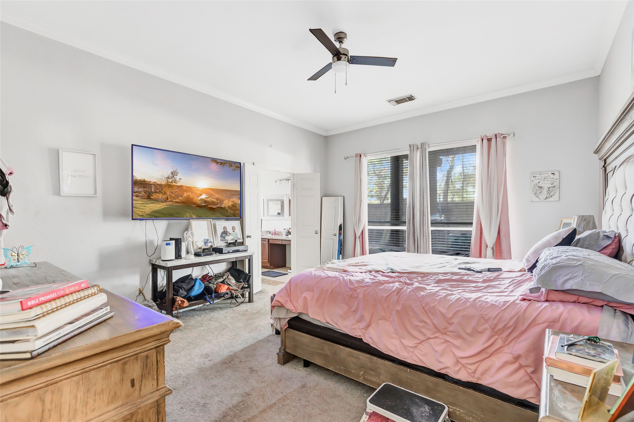 14415 Red Mulberry Lane Houston, TX 77044 - Photo 17 of 26 a bedroom with a bed and a flat screen tv
