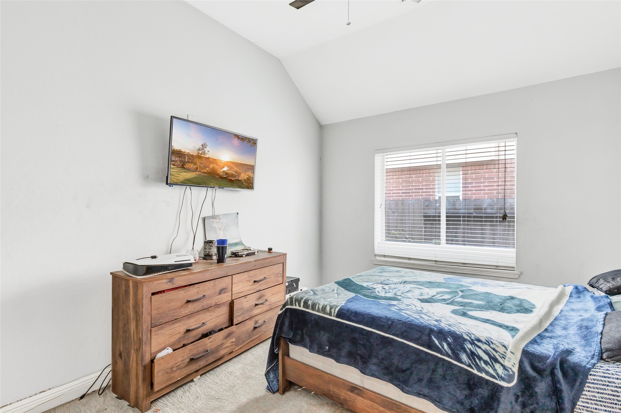 14415 Red Mulberry Lane Houston, TX 77044 - Photo 24 of 26 a bedroom with a bed and a flat screen tv