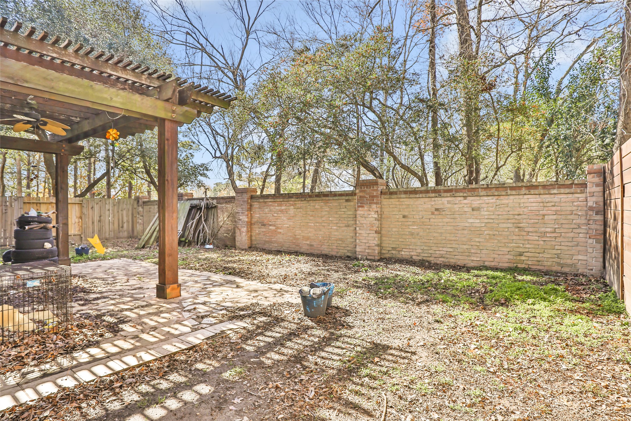 14415 Red Mulberry Lane Houston, TX 77044 - Photo 26 of 26 a view of a backyard with large trees