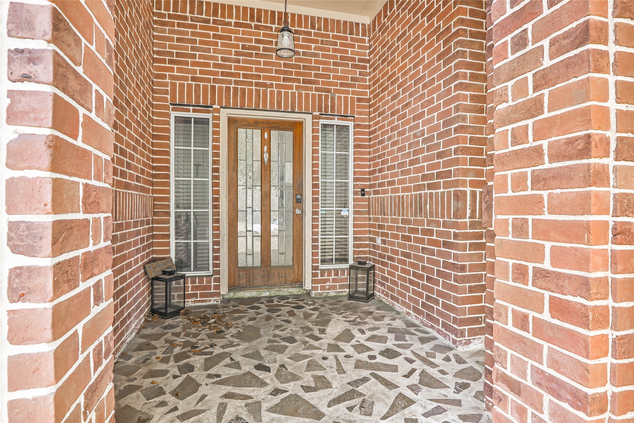 14415 Red Mulberry Lane Houston, TX 77044 - Photo 4 of 26 a view of a brick wall