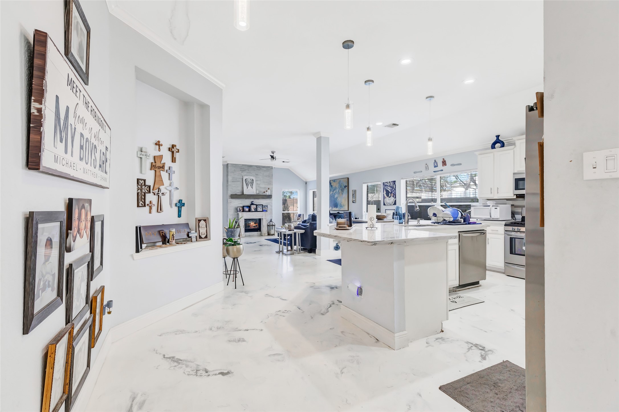 14415 Red Mulberry Lane Houston, TX 77044 - Photo 8 of 26 a view of kitchen with furniture and refrigerator