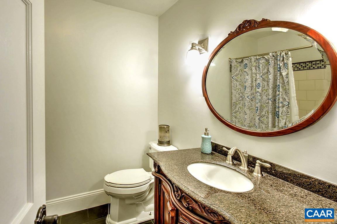 5975 Free Union Road Free Union, VA 22940 - Photo 12 of 25 This full bath is located on the main level.
