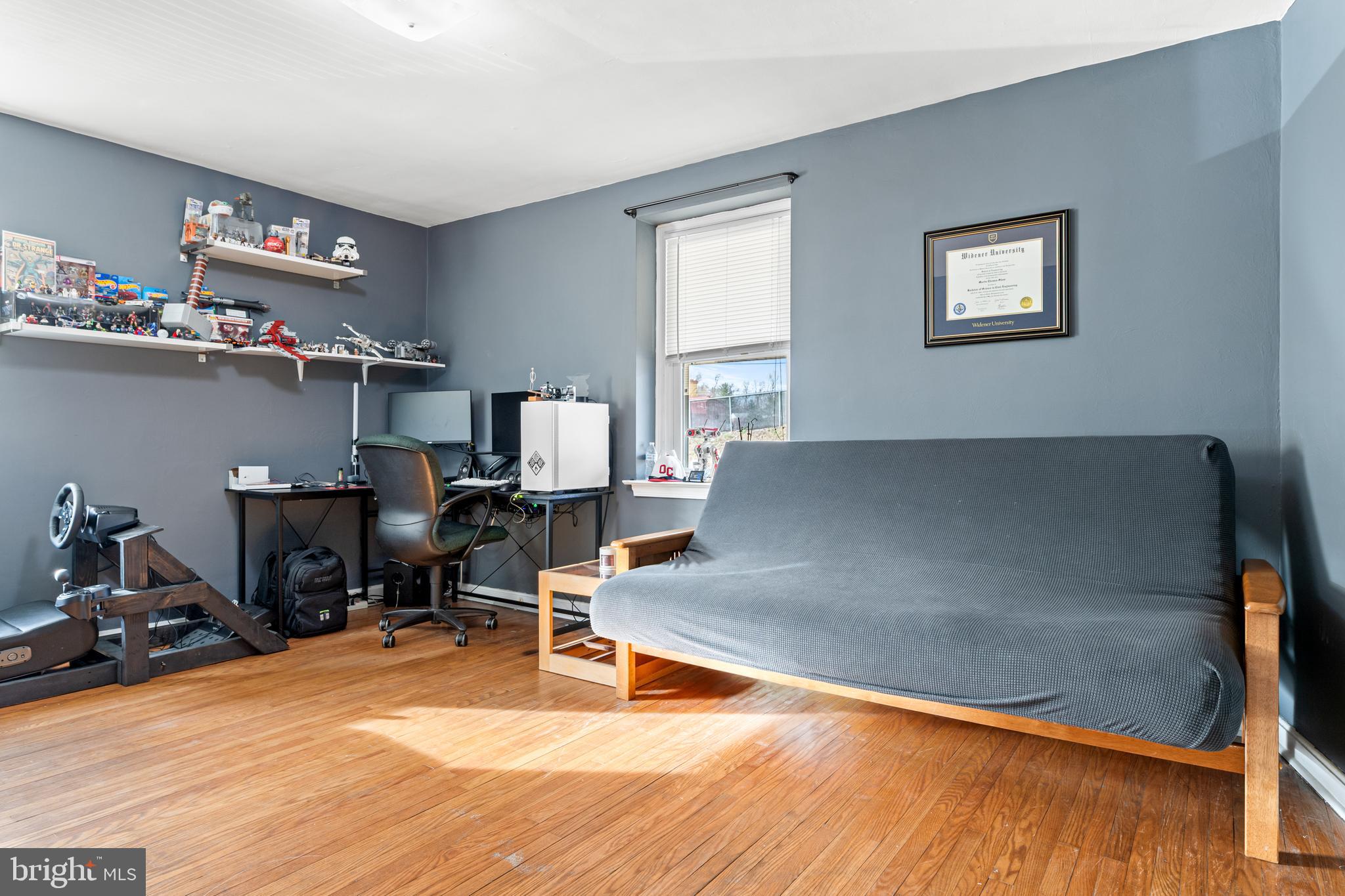 308 Providence Road Morton, PA 19070 - Photo 18 of 30 a living room with furniture and a wooden floor