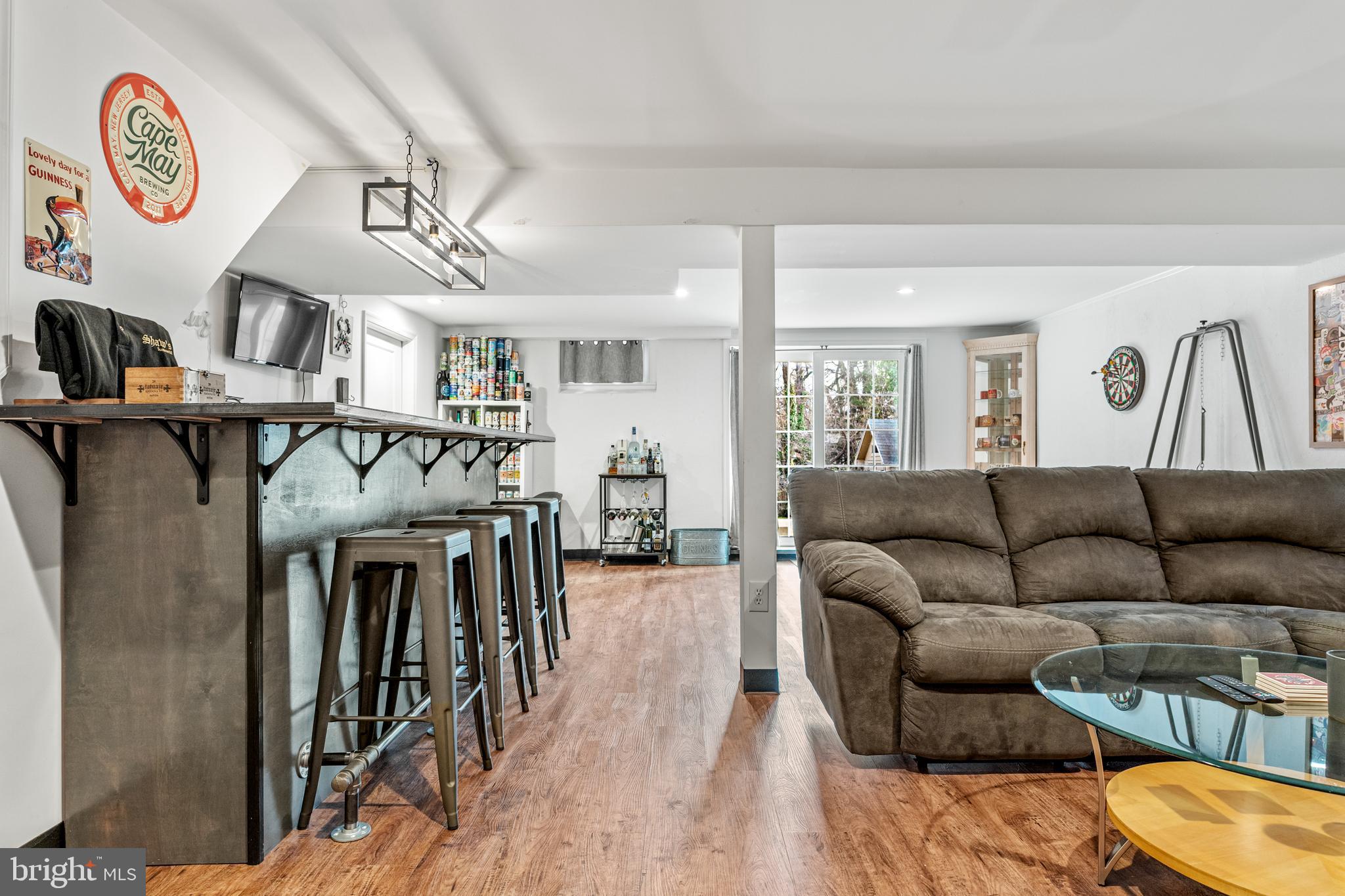 308 Providence Road Morton, PA 19070 - Photo 25 of 30 a living room with furniture and a chandelier